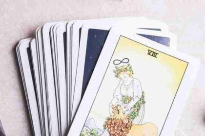 Strength Tarot Card Meaning: Love, Money, Health & More